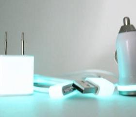White iPhone accessories with rhinestones on Teal Glow in the Dark charger set